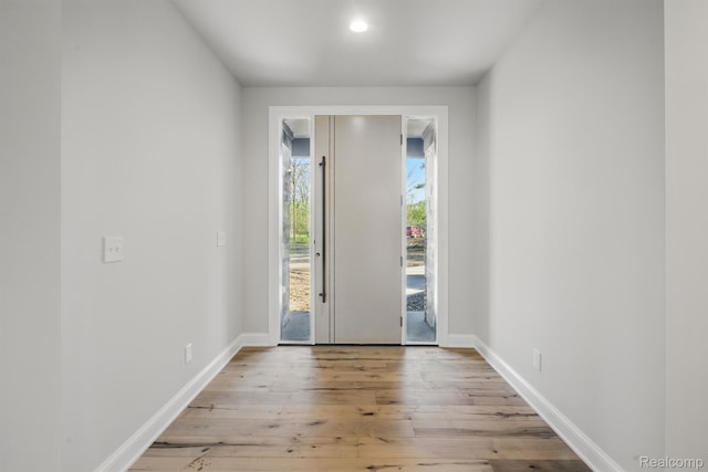 4030 Metamora Rdg, Metamora, MI 48455 - entryway with wood finished floors, baseboards, and recessed lighting