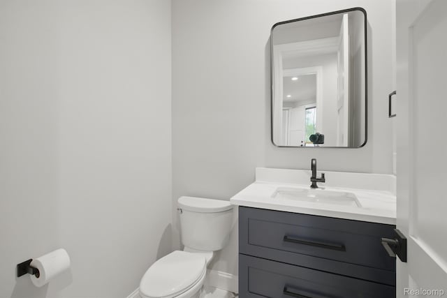 4030 Metamora Rdg, Metamora, MI 48455 - half bath with toilet, vanity, and baseboards