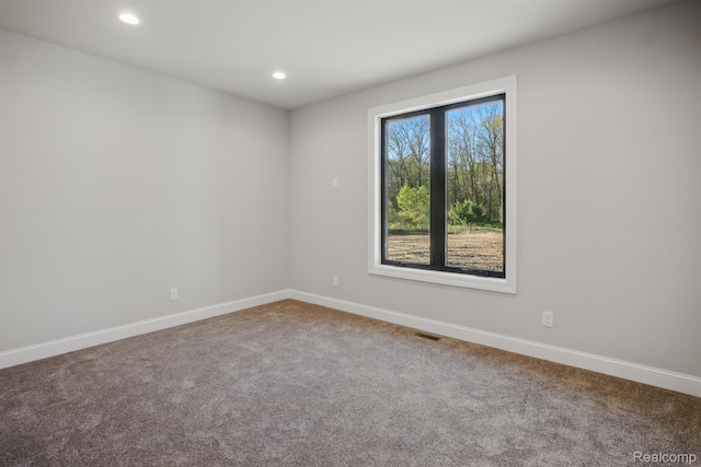 4030 Metamora Rdg, Metamora, MI 48455 - carpeted spare room with baseboards and recessed lighting