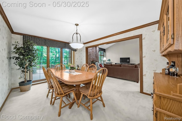 38836 Westchester Ln, Northville, MI 48167 - dining room featuring wallpapered walls, plenty of natural light, crown molding, baseboards, and light carpet