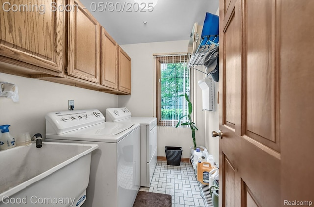 38836 Westchester Ln, Northville, MI 48167 - laundry area with cabinet space, independent washer and dryer, and baseboards