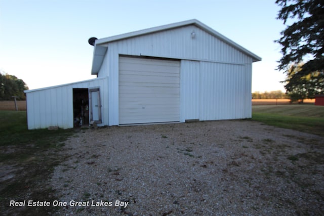 4141 Sagatoo Rd, Standish, MI 48658 - detached garage featuring dirt driveway