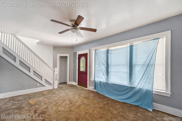 9419 Ravenswood St, Detroit, MI 48204 - entrance foyer featuring ceiling fan, carpet floors, baseboards, and stairs