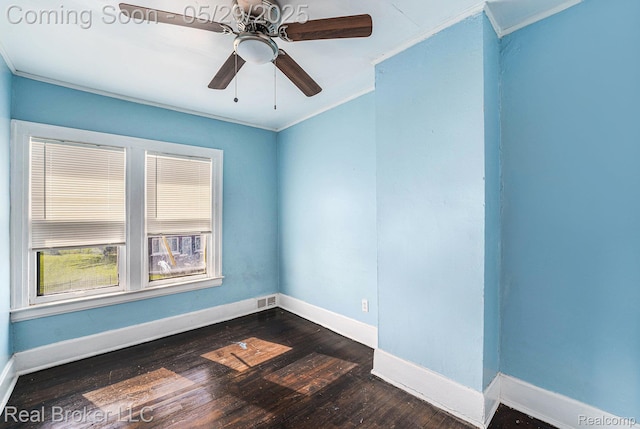 9419 Ravenswood St, Detroit, MI 48204 - spare room with crown molding, baseboards, dark wood-style floors, and ceiling fan