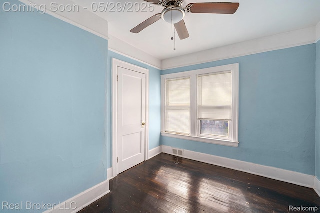 9419 Ravenswood St, Detroit, MI 48204 - unfurnished room featuring baseboards, dark wood finished floors, and a ceiling fan