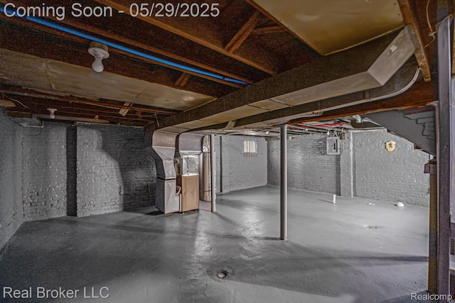 9419 Ravenswood St, Detroit, MI 48204 - basement featuring electric panel and heating unit
