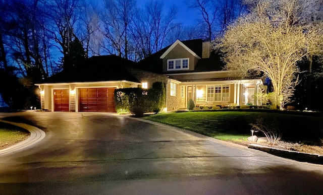 59 Scenic Oaks Dr S, Bloomfield Hills, MI 48304 - view of front of house with a yard, concrete driveway, and an attached garage