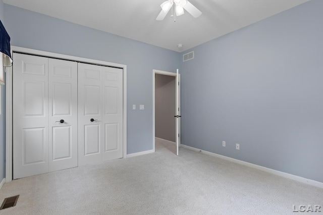 3079 Windmill Ct, Adrian, MI 49221 - unfurnished bedroom featuring carpet, baseboards, a closet, and ceiling fan
