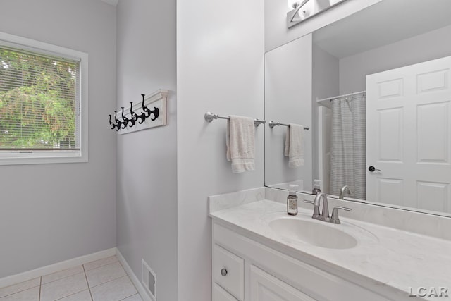 3079 Windmill Ct, Adrian, MI 49221 - bathroom featuring tile patterned floors, vanity, baseboards, and a shower with curtain