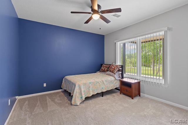 3079 Windmill Ct, Adrian, MI 49221 - carpeted bedroom with baseboards and ceiling fan