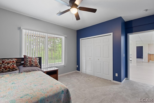 3079 Windmill Ct, Adrian, MI 49221 - bedroom featuring carpet floors, baseboards, a ceiling fan, and a closet