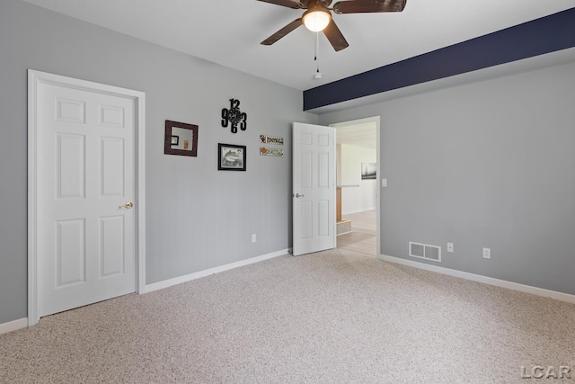 3079 Windmill Ct, Adrian, MI 49221 - unfurnished bedroom with carpet flooring, baseboards, and ceiling fan