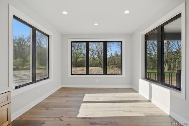 4075 Metamora Rdg, Metamora, MI 48455 - unfurnished room with healthy amount of natural light, recessed lighting, light wood-type flooring, and baseboards