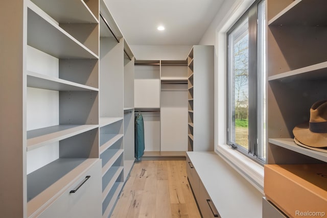 4075 Metamora Rdg, Metamora, MI 48455 - walk in closet featuring light wood-type flooring