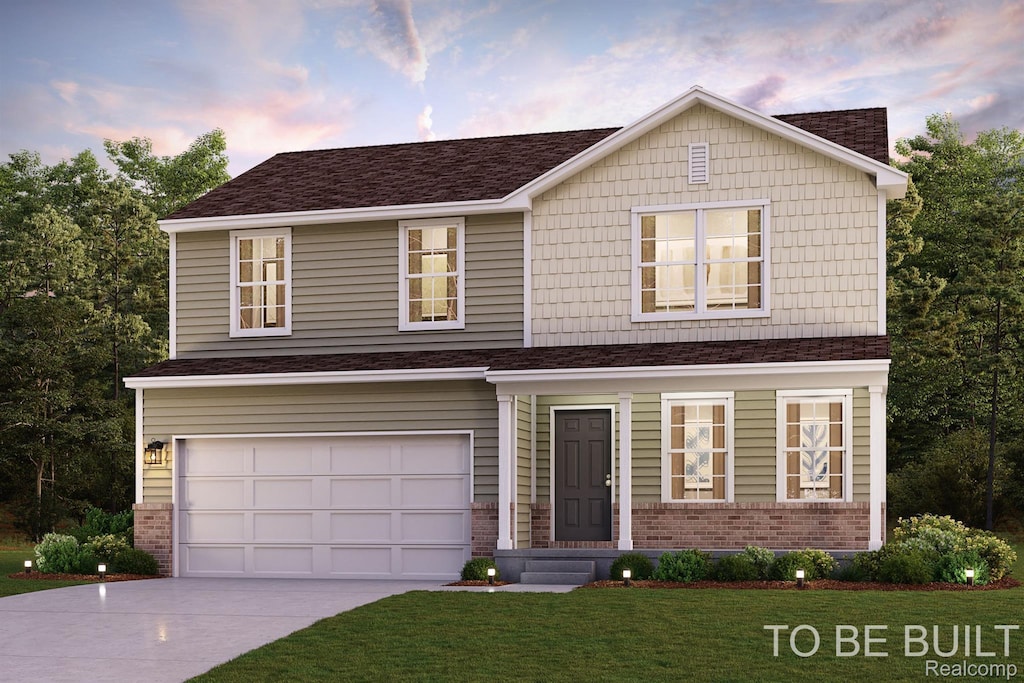 2205 Gunnison Ln, Monroe, MI 48162 - view of front of property featuring brick siding, driveway, a lawn, a garage, and a shingled roof