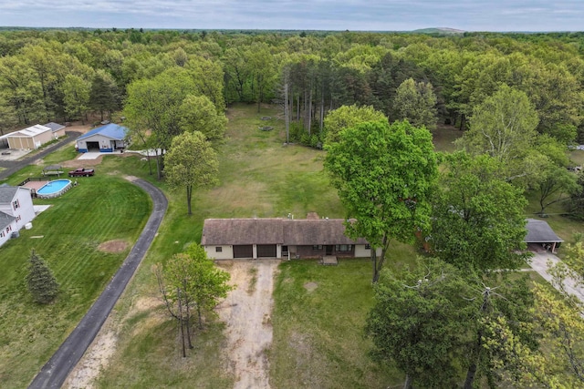12310 Seymour Rd, Montrose, MI 48457 - aerial view of property and surrounding area featuring a heavily wooded area