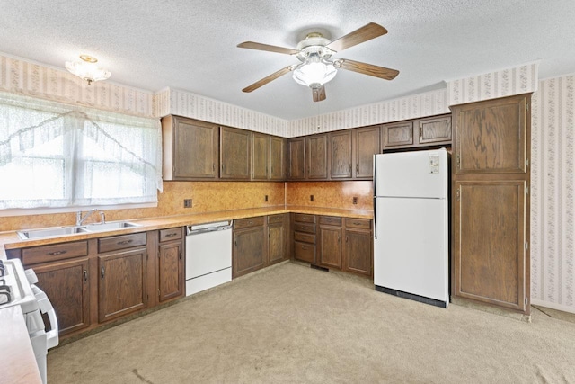 12310 Seymour Rd, Montrose, MI 48457 - kitchen with white appliances, wallpapered walls, light colored carpet, a textured ceiling, and a ceiling fan