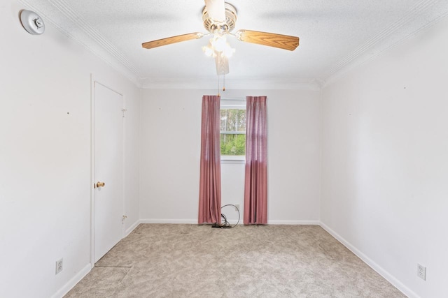 12310 Seymour Rd, Montrose, MI 48457 - empty room with carpet floors, ornamental molding, a ceiling fan, baseboards, and a textured ceiling