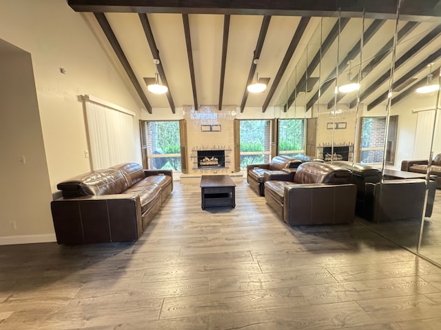 3 Colony Ln, Dearborn, MI 48120 - living room featuring hardwood / wood-style floors, a large fireplace, and baseboards