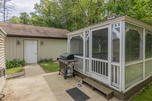 10303 Walnut Dr, Three Rivers, MI 49093 - view of patio with grilling area and a sunroom