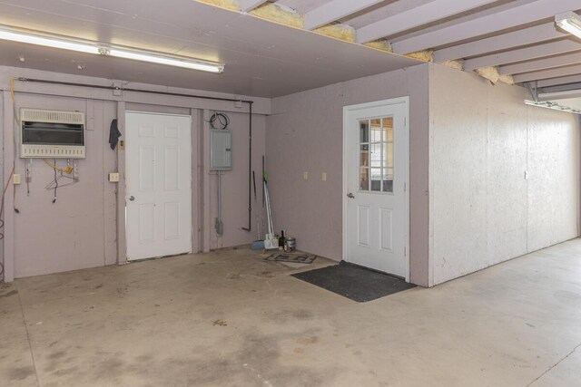 10303 Walnut Dr, Three Rivers, MI 49093 - garage featuring electric panel and heating unit