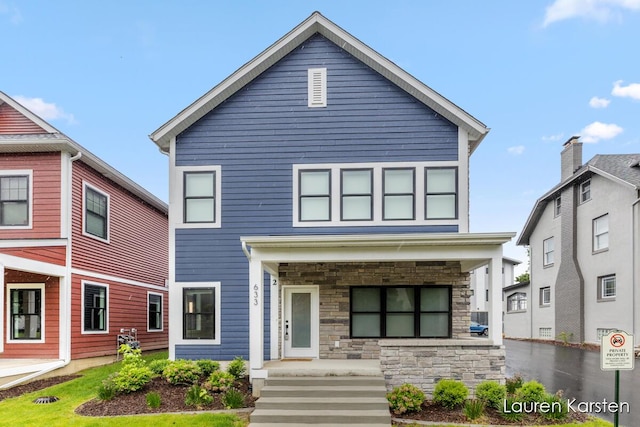 633 Fairview Ave NE Unit 2, Grand Rapids, MI 49503 - view of front of home with stone siding and a porch