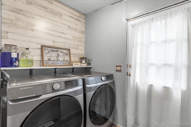 351 N Squirrel Rd, Auburn Hills, MI 48326 - laundry room with wooden walls, independent washer and dryer, and a textured ceiling