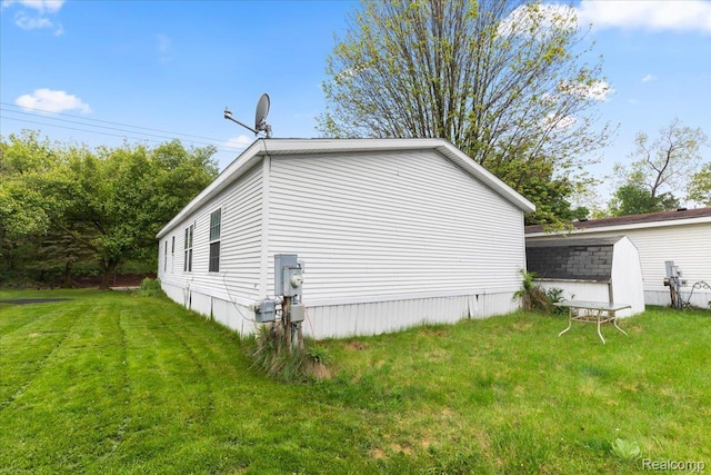 351 N Squirrel Rd, Auburn Hills, MI 48326 - view of home's exterior featuring a lawn
