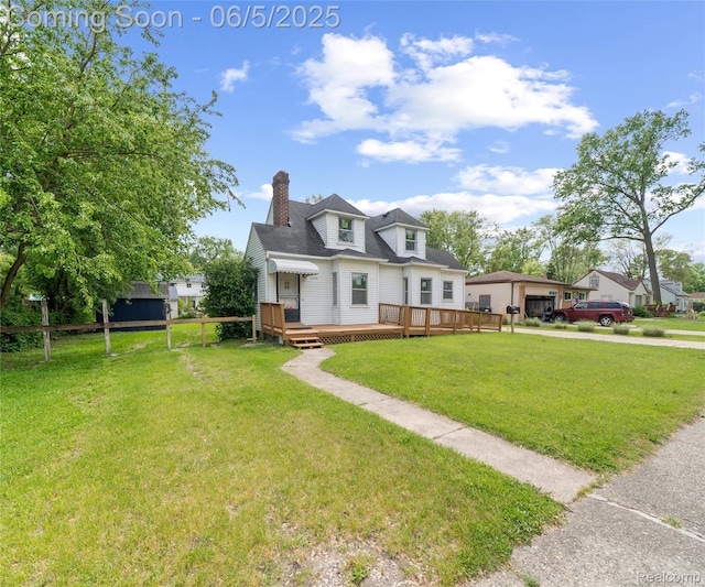 31777 Hennepin St, Garden City, MI 48135 - view of front of house with a deck and a chimney