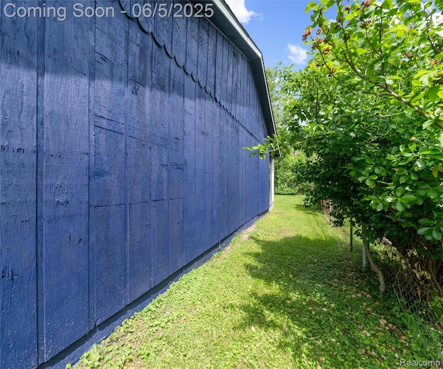 31777 Hennepin St, Garden City, MI 48135 - view of side of home featuring a yard