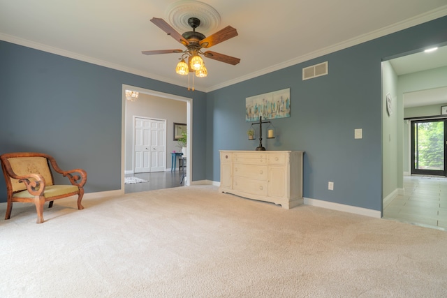 14607 Stratford, Shelby Twp, MI 48315 - sitting room featuring a ceiling fan, carpet flooring, baseboards, and crown molding