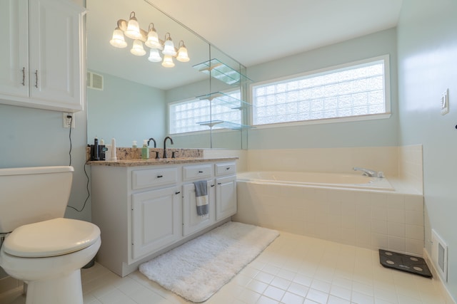 14607 Stratford, Shelby Twp, MI 48315 - bathroom featuring toilet, a garden tub, vanity, and tile patterned flooring