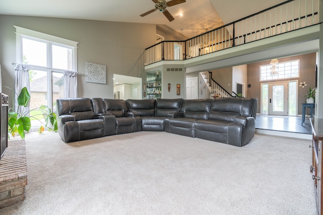 14607 Stratford, Shelby Twp, MI 48315 - living room featuring high vaulted ceiling, carpet, stairs, and ceiling fan