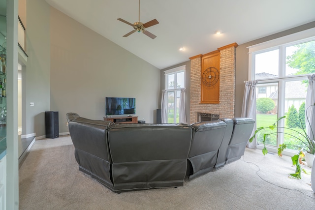 14607 Stratford, Shelby Twp, MI 48315 - living room featuring light carpet, high vaulted ceiling, ceiling fan, a fireplace, and recessed lighting