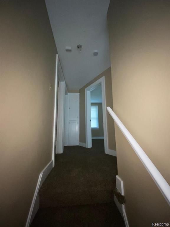9966 Hartwell St, Detroit, MI 48227 - hall with carpet and baseboards