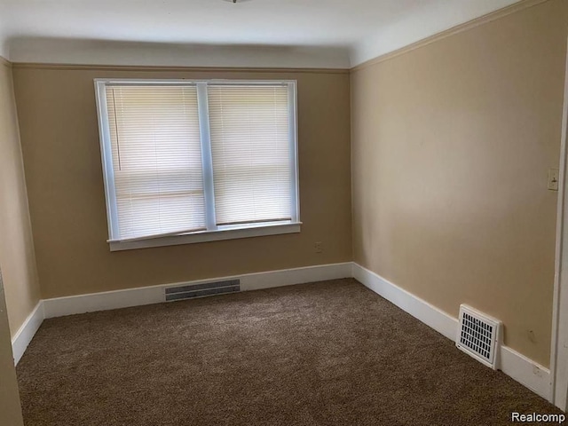 9966 Hartwell St, Detroit, MI 48227 - empty room with carpet flooring and baseboards