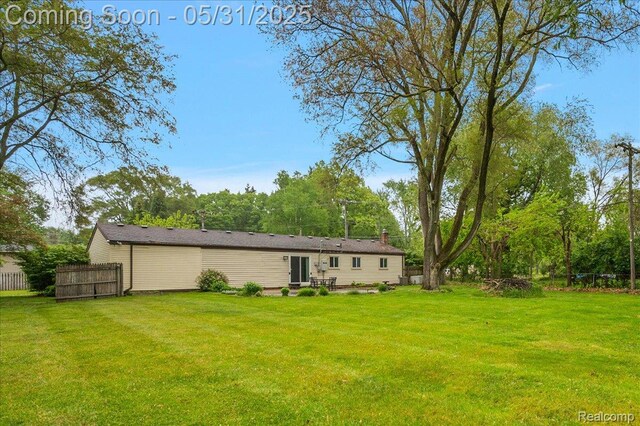 2920 Pinto Dr, Commerce Twp, MI 48382 - view of rear view of house