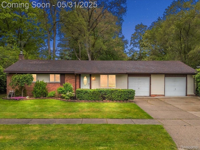 2920 Pinto Dr, Commerce Twp, MI 48382 - view of front of home with brick siding, a front yard, concrete driveway, a chimney, and an attached garage