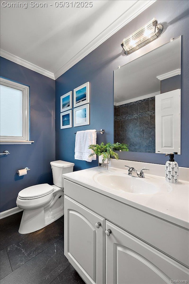 2920 Pinto Dr, Commerce Twp, MI 48382 - bathroom with vanity, toilet, crown molding, baseboards, and marble finish floors