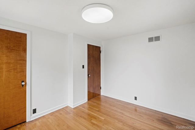 99 Wenonah Dr, Pontiac, MI 48341 - spare room with light wood-type flooring and baseboards