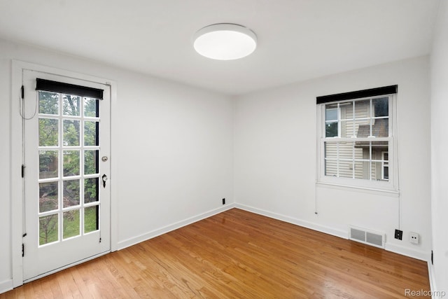 99 Wenonah Dr, Pontiac, MI 48341 - spare room featuring light wood-type flooring and baseboards