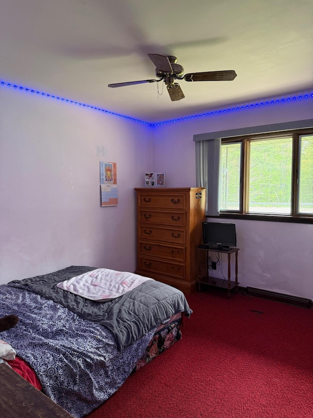 3104 Chippewa Hwy, Manistee, MI 49660 - bedroom with carpet floors and ceiling fan