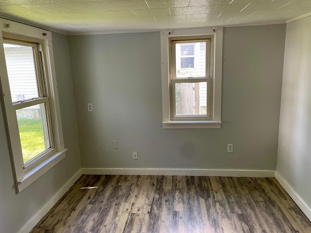 612 N Prospect St, Sturgis, MI 49091 - unfurnished room featuring wood finished floors, baseboards, and ornamental molding