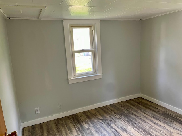 612 N Prospect St, Sturgis, MI 49091 - empty room featuring wood finished floors and baseboards