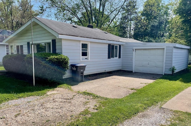 612 N Prospect St, Sturgis, MI 49091 - view of home's exterior with a garage, driveway, and a shingled roof