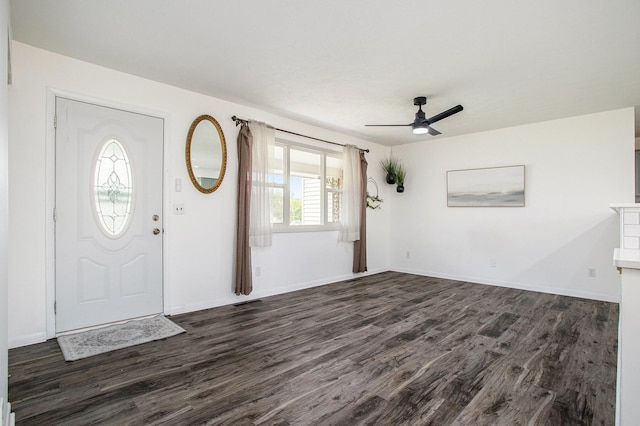 1246 Chalmers Dr, Battle Creek, MI 49015 - entryway featuring dark wood-style floors, a ceiling fan, and baseboards
