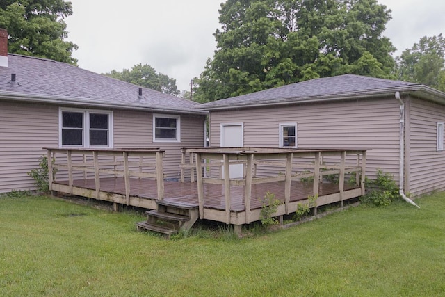 455 N Centre St, Schoolcraft, MI 49087 - rear view of property featuring a deck, a lawn, and a shingled roof