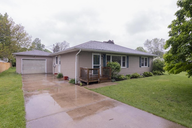 455 N Centre St, Schoolcraft, MI 49087 - single story home with driveway, an outdoor structure, a front lawn, and roof with shingles
