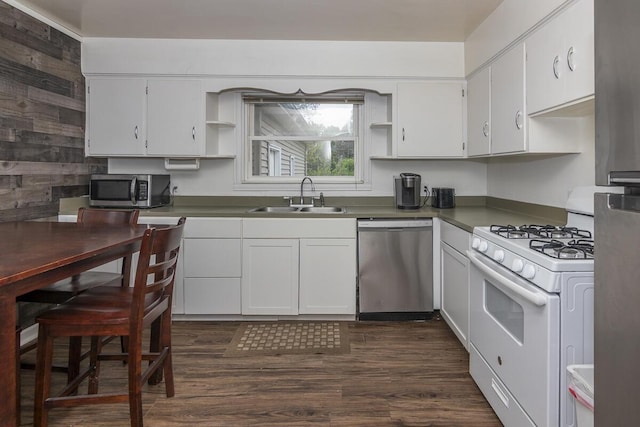 455 N Centre St, Schoolcraft, MI 49087 - kitchen featuring stainless steel appliances, open shelves, a sink, white cabinets, and dark wood-style flooring
