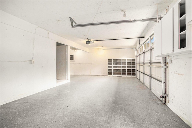 329 N Liberty St, Marshall, MI 49068 - garage featuring a garage door opener